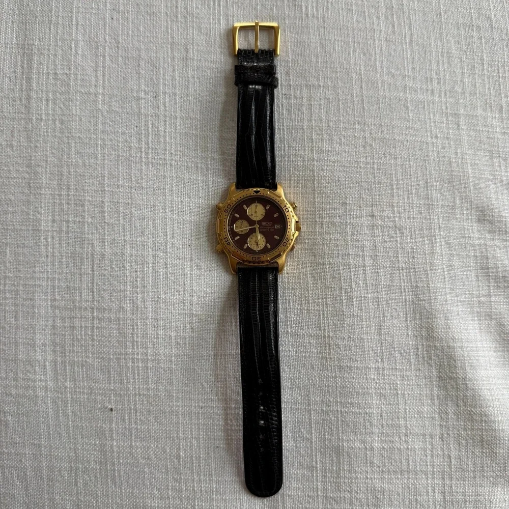 Seiko Sports 150 Chronograph Maroon Dial Gold Tone Watch 7T32-6B89 Black Leather